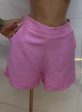 conjunto short e colete com cinto